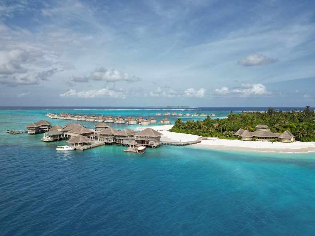 Aerial view of Thaa Atoll in Maldives featuring turquoise lagoons and luxury overwater villas for a complete atoll-by-atoll guide.