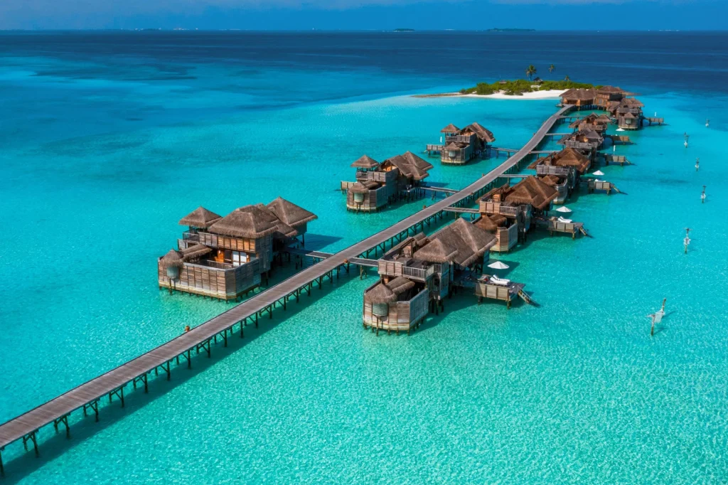 Luxurious overwater villas at Gili Lankanfushi resort in Maldives, perfect for a romantic honeymoon destination.