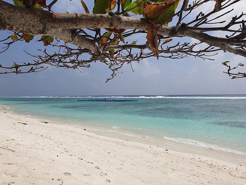 Aerial view of Hulhumale Beach in Maldives, featuring crystal clear turquoise water and white sandy shoreline for travel photography.