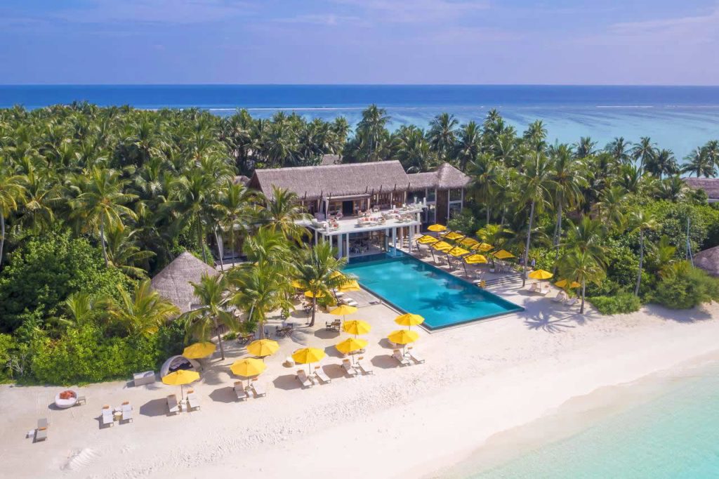 Aerial view of Niyama Private Islands Maldives beach pool villa and turquoise lagoon in Dhaalu Atoll.