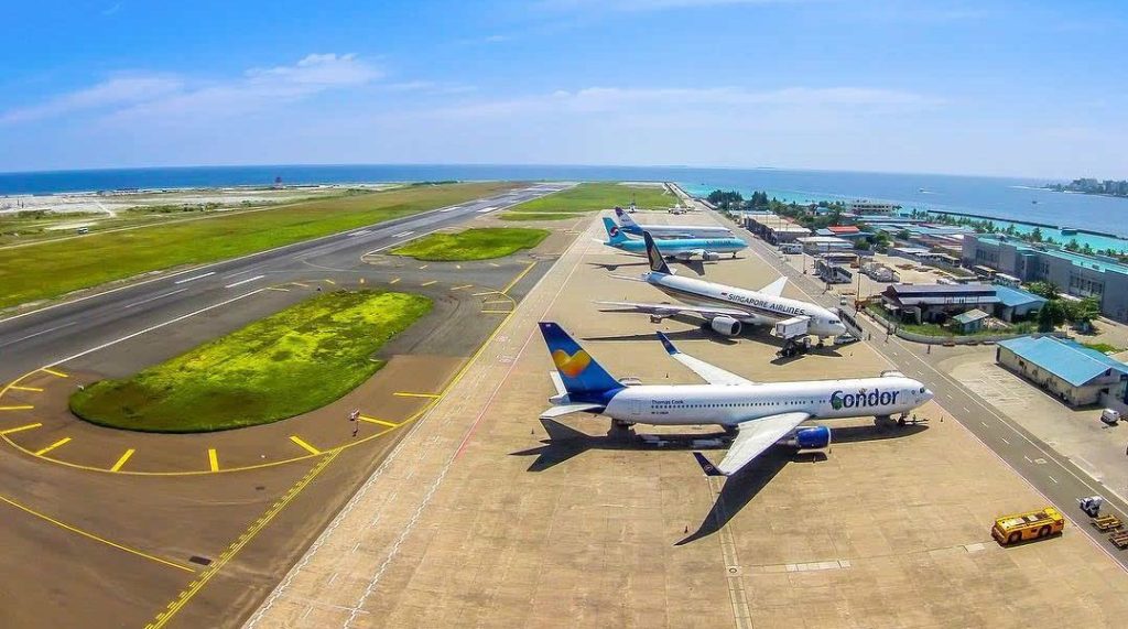 Step-by-Step Arrival Guide: What to Do First Arriving in the Maldives in the first time may be quite overwhelming, especially when your plane arrives late in the night, after having taken a long international flight. The good thing is that the arrival is easy as soon as you are aware of the order. The Maldives has one of the most friendly policies which tourists can enjoy, which is the absence of a pre-arranged visa. One of the things that people love about traveling to the country is a 30-day free on-arrival visa that is automatically applied when the person is entering the country eliminating a whole layer of paperwork before the trip. Step 1: Complete the IMUGA Form Before You Board You must complete the IMUGA Traveller Declaration form on line up to 96 hours prior to your flight. This is a health and travel declaration form that is mandatory. After successfully filling it, you will be given a QR code which you will present to the immigration officer on reaching the counter. This can be completed beforehand and wasted time at the immigration line will be saved, not to mention forgetting to do it which will result in a considerable delay. The questionnaire is simple and does not require more than a few minutes to fill. Step 2: Have Your Documents Ready You will be required to have your passport that has not expired less than a month, a confirmed ticket to fly back home and a hotel or resort reservation. Also have print and electronic versions. The immigration officers usually request to view the booking confirmation especially during the rush times at the arrival terminals and therefore it is a little but helpful habit to get used to to have it readily available as opposed to somewhere in the depths of your email inbox. Step 3: Go Through Immigration The processing of the immigration in the Velana Airport normally takes between 45 and 90 minutes after entering the queues. When the season is at full blast (usually in the period between October and April), or when more than one large aircraft is being handled at the same time, processing tends to skew towards the long end of the range. The queues are not that fast, and the only trick that one can use is to have your QR code ready, be patient and do not keep changing the lanes. Step 4: Collect Your Baggage and Clear Customs You pass the immigration, and go down the stairs to the baggage belts to get your checked luggage. You go through customs after you have your bags. Maldives has very rigid restrictions on some products, alcohol, pork or pork products and tobacco are absolutely prohibited into the country. Scanning of customs is done carefully and all these products found in your baggage will be seized without fail. Exempts and partial allowances do not exist in tourists. In case you are passing through a country whereby you may carry duty-free alcohol, then never carry it to the Maldives. Step 5: Find Your Resort Representative in the Arrival Hall As soon as you leave the customs and enter the arrival halls, you will see a large yet well-coordinated area with a bunch of counters and representatives in place with placards of various resorts and tour operators. Identify the counter or representative of your hotel or resort. They will direct you on the next half of your trip, be it a walk to the speedboat dock, a shuttle bus to the seaplane terminal, or another set of directions to the domestic terminal to a connecting flight. The representatives of the resorts are mostly extremely familiar with the newly arrived, jet-lagged guests and they are worth visiting before you can even find your way on your own. Step 6: Pick Up a SIM Card and Exchange Currency At the arrivals hall, only a couple of meters at the customs exit, there will be SIM card shops and a Bank of Maldives currency exchange counter. They are discussed in detail below. In case it is time sensitive like the seaplanes transfers are which can only be done during the day, it is best to have the seaplanes transfer you to your resort representative and get the SIM and currency afterwards either at the airport or at your resort.