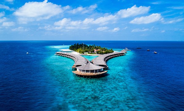 A beautiful view of Fulidhoo Island beach with turquoise water and white sand, one of the best local islands in Maldives for budget travelers in 2026.
