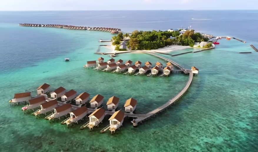 Start at the beginning if you want to grasp what's missing. Back in 1972, an Italian working in travel teamed up with someone from the Maldives to launch the nation’s first high-end beach escape. Smooth sands, clear water, steady heat - these pulled people fast. One by one after that, island spots turned private; 171 more joined over half a century. That stretch? Roughly three new retreats each year without pause. Hard to believe how quickly empty land became booked rooms.

Most Maldivian islands today - around one in seven - are built just for rich overseas guests. Here’s what those holiday spots won’t highlight: almost all are run by big global companies. Foreign cash pours into these private zones but hardly reaches regular people across the islands. It comes in fast - and slips away faster.

What stands out grows clearer when seen through politics. Before 2008, power sat tightly held in few hands across the Maldives. Staying on inhabited islands was off limits to visitors by law. Only resort zones welcomed travelers, creating separation like a wall built with rules. This kept locals distant from tourism profits, also shielding culture from foreign influences. Money pouring in from resorts fed authority more than neighborhoods.

It was 2008 when people in the Maldives began feeling worn down by how things were run. Democracy took a new step forward that year with real elections happening across the nation. Come 2009, after years of tourists being kept separate, travelers could finally sleep on regular inhabited islands.

Right away, things changed completely. Across the small nearby islands, hundreds of guesthouses started popping up. People who once worked at big resorts carried what they learned back to their villages, then launched their own places to stay. Suddenly, those long-dominant resorts faced real rivals.

Instead of cutting costs, they pushed prices up. That choice came with a twist - pouring money into shaping how people saw the place. Free luxury stays went out to hundreds of travel writers, YouTubers, influencers, all asked to share dreamlike images of the islands. These posts kept the fantasy alive online. Commissions landed in travel agents’ pockets worldwide, nudging them to sell high-end packages. Over time, belief hardened: even now, long after local guesthouses opened, many think visiting means spending like it's a lifetime purchase.

As one local Maldivian, Saeed, explained it plainly: “In foreign countries, most of the people advertise the tourism side of the country, so that means tourism in the Maldives is for celebrations or honeymoons, so they are very expensive. In the world, everybody thinks that Maldives is a very expensive country. But here in the Maldives, we have something for every budget.”

He pointed out that you can find rooms starting at forty dollars each night. On the opposite side, some go as high as fifty thousand. Every price in between shows up somewhere. People who move around usually catch wind of just the cheaper options.