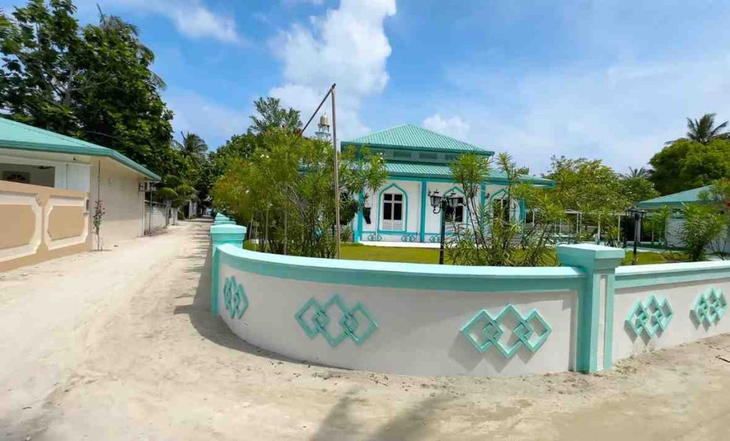 What really draws people to local island hopping in the Maldives isn’t just scenery - on Omadhoo, daily rhythms unfold without pause. Life moves at its own pace here, shaped by routine rather than tourism. Instead of resorts, you find weathered wooden doors, kids racing bikes down narrow lanes, fishermen mending nets near the dock. The air carries salt, laughter, the sizzle of street food at dusk. Shops open late, close early, run on trust more than timetables. This isn’t performed for visitors. It simply is.

Out there near the shore, I saw someone handling valhomas - Maldivian dried tuna - for dinner later. Smoke first, then hours under the sun, that is how they ready the fish. Pieces moved bare-handed onto sand, right where people walked. A quiet moment, yet loud with meaning, far from anything polished inside tourist spots.

Out in Omadhoo, the call to prayer doesn’t just fade into the air. It settles over things like something you can feel. Each time it sounds, life pauses - stores pull down their shutters. Later, when the moment passes, doors swing open again. People move with it, adjusting without thinking.

Work continues across the area. New builds show up here and there, giving the sense that changes are slowly taking shape for people who live here and those passing through. Where a wide open stretch once stood, a compact soccer field now sits - proof that ideas about land use keep shifting.

Most days near the shore, trash spilled from bins untouched by workers. That sight might surprise some visitors expecting tidier scenes. Still, this doesn’t mean people there ignore upkeep. Away from the coast, paths stayed free of litter. Spotless sidewalks told another story altogether.