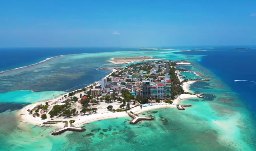Here’s the thing about picking your spot in the Maldives - it shapes pretty much everything else. If saving money matters, there’s really just one clear choice: Maafushi Island.

Over recent years, Maafushi has quietly become the go-to spot for budget travelers exploring the Maldives. Instead of resorts, you’ll find rows of family-run guesthouses popping up along sandy lanes. Locally owned eateries serve meals without markup, thanks to steady competition among them. Tour operators set up shop near the harbor, offering dives and excursions at straightforward pricing. A bed in one of these lodgings runs between thirty and fifty dollars each night. Even the neater places - those with tiled floors and daily cleaning - are still far cheaper than entry-level rooms elsewhere across resort islands. What makes it stand out isn’t flashiness - it’s how accessible everything feels. Travelers arrive expecting compromise but often leave surprised by comfort on such a tight budget.

Freedom shows up in surprising ways on Maafushi. Staying at a high-end resort means meals come only from their kitchens, activities booked through staff who add extra cost behind the scenes. Here, picking your own dinner spot feels different - lighter, more open. You match with local guides instead of pre-packaged plans. Days unfold without a fixed rhythm imposed by someone else. Each choice you make pulls expenses down, quietly. The lack of restrictions shapes the trip just as much as the views do.

The One-Night Luxury Villa Strategy

Here’s when cutting costs starts making real sense. Not skipping the fancy getaway altogether, but slotting it in on purpose: a single evening, all-in, inside a true overwater bungalow.

Four nights were logged on Maafushi, tucked into low-cost stays. One evening shifted to a floating room at Paradise Island Resort. That pick wasn’t accidental. Among high-end spots, it sits nearest to Velana International Airport. Access happens by fast boat instead of flying boats. Those air rides demand four hundred to eight hundred dollars each way, single traveler. That quick ride on a small boat to Paradise Island Resort lasts about twenty minutes, costing far less than many expect. Choosing a place reachable by water means smart timing - slip it into your schedule right after landing or just before heading home. This move skips the surprise price jump that trips up plenty of newcomers to the Maldives. Hidden costs fade when travel lines up smoothly.

A single night in a water villa at Paradise Island Resort usually costs between $1,000 and $1,500 when booked at full price, yet deals or early reservations often lower the amount. Though priced high by default, spending dropped sharply due to discounts and timing. Staying in basic guesthouses for four nights, then upgrading once, shaped the overall expense. Each traveler paid just $49 for all five nights combined, thanks to mixing cheap lodgings with one premium stay near the end. Price tags may start steep, though actual payments rarely match them without some planning ahead.

The Day Tour Alternative for the Luxury Resort Experience

Spending a night at a fancy island retreat might not fit every wallet. Still, plenty of Maldivian resorts welcome visitors just for the day, opening up lagoons, dining spots, palm-lined paths, and photo-ready bridges. Skip the room booking entirely. Many include swim areas and open-air eateries in the pass. On Maafushi, local stays often handle bookings themselves. These trips suit people chasing postcard moments minus the full bill.